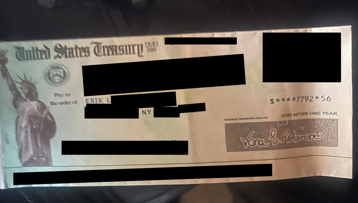 Redacted recovery check for $7,792.56